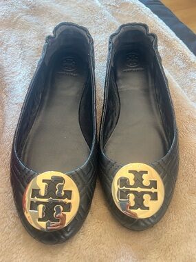 Tory Burch Black Quilted Flats with Gold Logo Medallion
